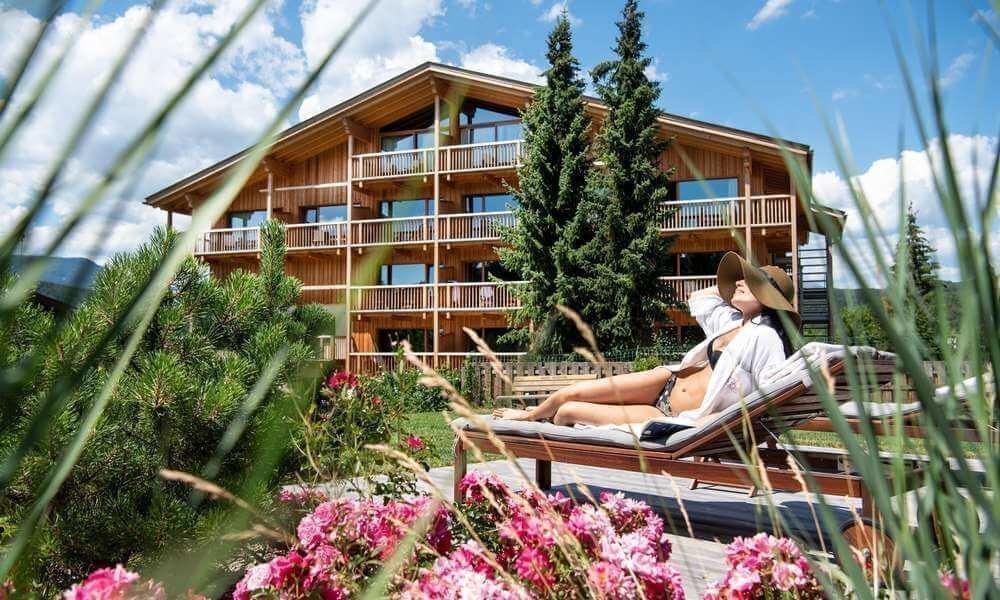 Where can you soak up the sun in an alpine holiday?